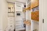 Custom primary walk-in closet