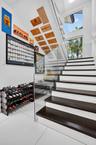 NATURAL LIGHT FLOWS EFFORTLESSLY WITH GLASS RAILS