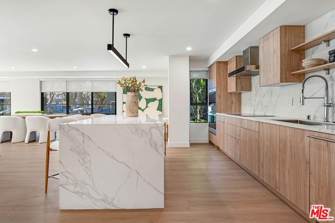 Kitchen with Wood Paneled Appl