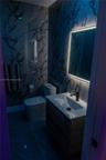 Full-height stone-finish wall cladding, modern floating vanity with integrated rectangular sink, matte black faucet, wall-mounted LED-backlit mirror, 