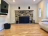 Living rm w/wood burning FP