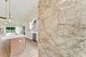 Gorgeous crystallo quartzite stone as a beautiful accent wall at the entrance