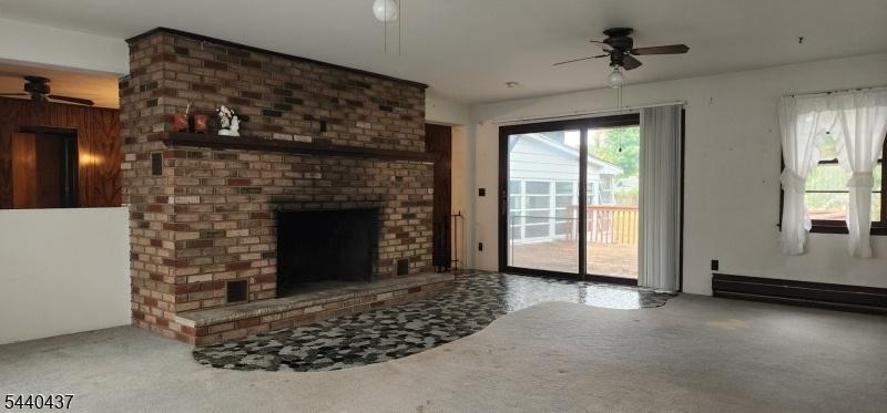 LR facing the fireplace & SGD
