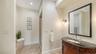 en suite for the guest bedroom with walk in shower