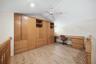 Second Floor Loft with built-in storage and desk.