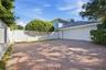 Two Car Garage with Side Entry, allows for additional parking. Concrete Paver Driveway
