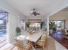 family room virtually staged as a dining area