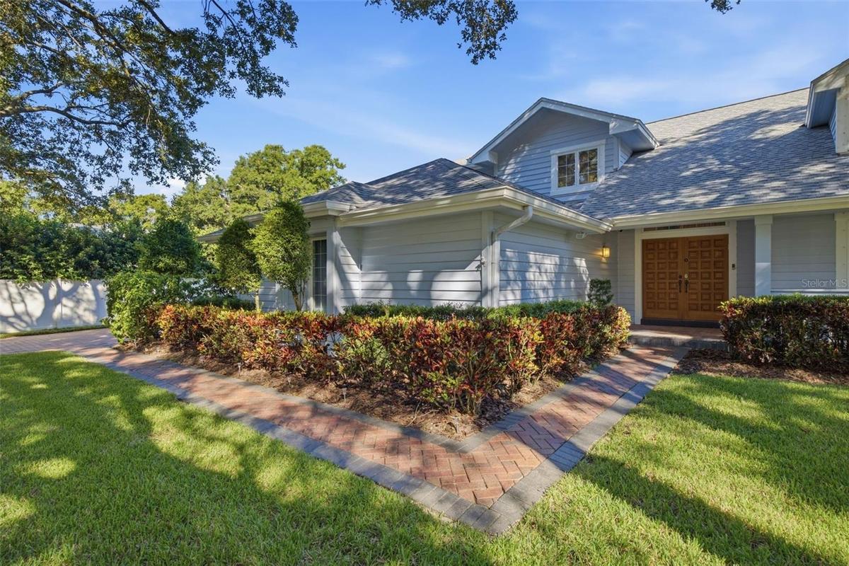 Concrete Paver entry from driveway to front door.