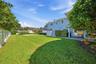 Large lush green lawn on an oversized lot