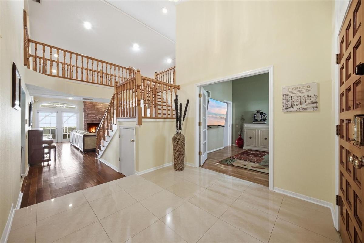 Entry Foyer and double entry French doors to the Den