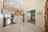 Entry Foyer and double entry French doors to the Den