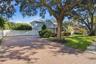 Concrete Paver Driveway, Mature Landscaping, Side Entry Garage