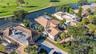 aerial of house and pond