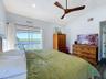 Primary Bedroom With View Of River