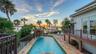 Easy access from kitchen/dining room/ outdoor living space/ first floor primary bedroom to the pool area