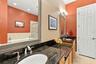 Primary Bedroom with En-Suite Bathroom, His & Her Walk-in Closets, Double sinks with Granite countertops, jacuzzi tub, separate shower