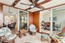 One of a kind outdoor space showcases beautiful African Mahogany trim, teak wall panels, and an impressive 14 coats of varnish, reflecting the craftsm