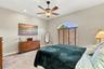 Primary Bedroom with En-Suite Bathroom, His & Her Walk-in Closets, Double sinks with Granite countertops, jacuzzi tub, separate shower