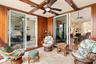 One of a kind outdoor space showcases beautiful African Mahogany trim, teak wall panels, and an impressive 14 coats of varnish, reflecting the craftsm
