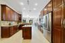 Beautiful Kitchen with center Stove Top !