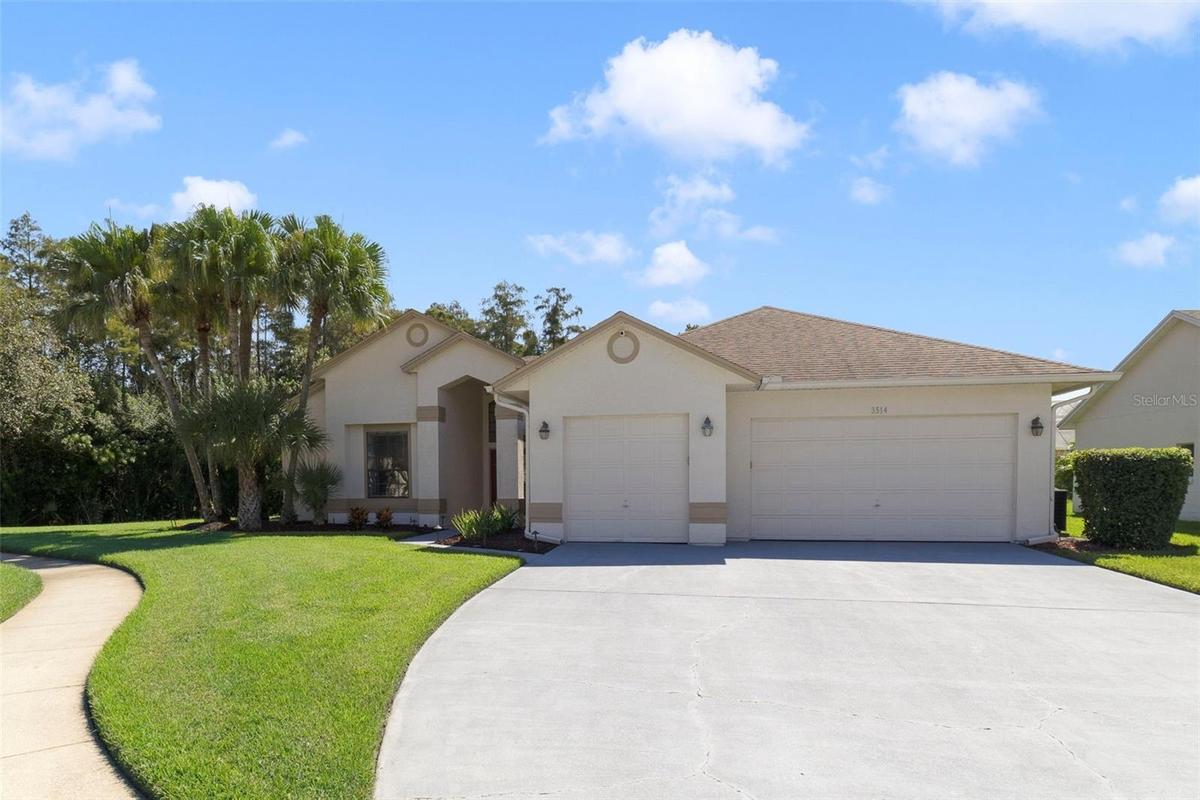3 car garage with custom workshop, huge driveway