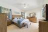 Primary Bedroom with sliding glass doors to out back