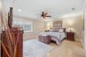 Primary bedroom features 2 walk in closets