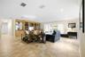 Spacious living area overlooking large lot and screened lanai