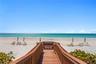 Private beachfront access places the sugar white sands and turquoise Gulf waters just moments from home.