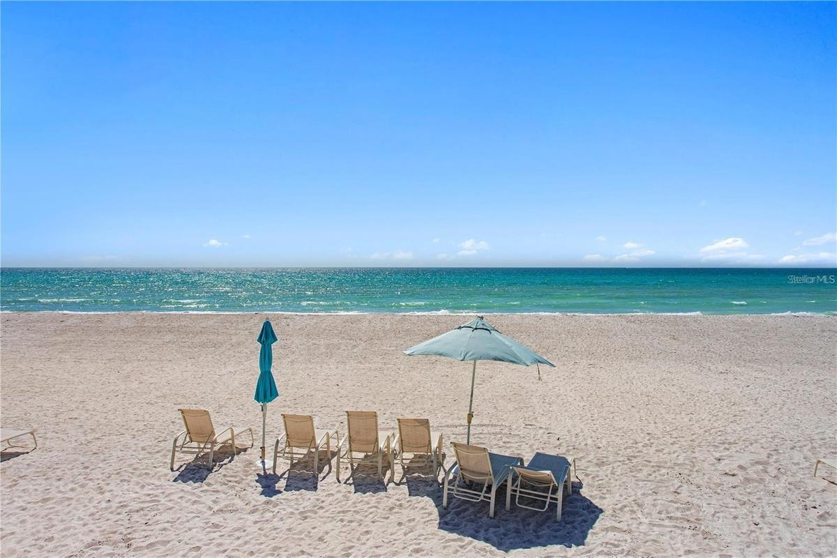 Enjoy the exceptional beachfront lifestyle with private access to the pristine shores of Longboat Key.