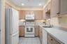 Kitchen with ample cabinetry and counter space