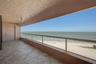 Step out onto the balcony from the Living area