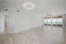Large Living / Great room with Sliders leading to the Gulf front Balcony