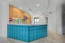 The Contemporary Kitchen with glassed breakfast bar!