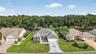 Aerial Front Elevation with Golf Front Views