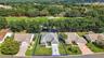 Aerial Front Elevation with Property Lines and Expansive Golf Front Views!