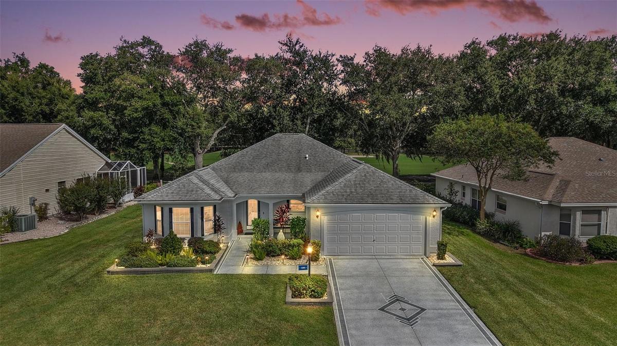 Twilight Front Elevation with Golf Front Views