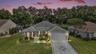 Twilight Front Elevation with Golf Front Views