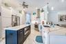 Custom cabinets with built in microwave.  Pull out drawers for easy access and tall Cabinets with pull out shelving