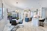 Dinette in Kitchen/Family room area.  Tile floor throughout the home.  Single height counter with seating