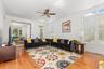 The sun-filled living room offers a versatile space designed for today’s work-life balance. Flowing seamlessly into the sitting room and kitchen, its 