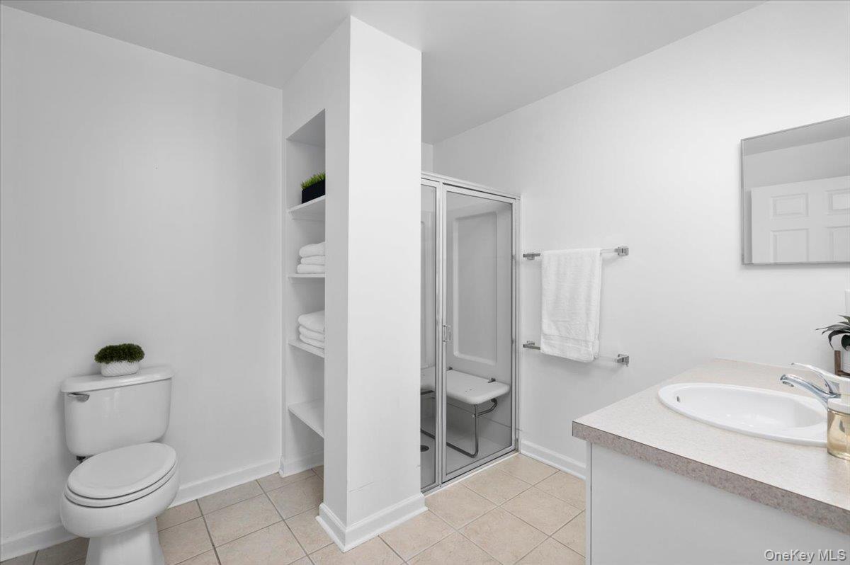 A primary bathroom with space