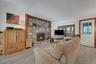 A beautiful stone fireplace is an added bonus.