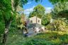 Nestled in between some beautiful mature plantings creates plenty of privacy here.