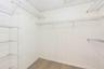 The Primary walk-in closet provides generous storage.