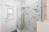 The second full Bath, also COMPLETELY UPDATED IN 2026, features dual sinks, a walk-in shower and a convenient door leading directly to the pool area.