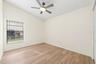 On the opposite side of the home, three additional Bedrooms provide flexibility for family, guests or a home office. Bedroom 4
