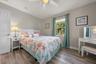 Guest bedroom overlooks backyard