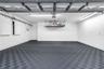Pristine Garage Space with heavy duty matting for cars, workout or projects