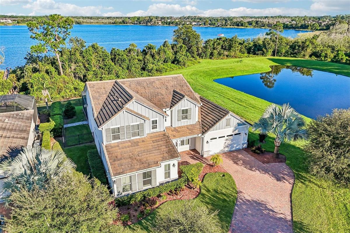 Perfectly situated on a quiet cul-de-sac on Lake Huckleberry!